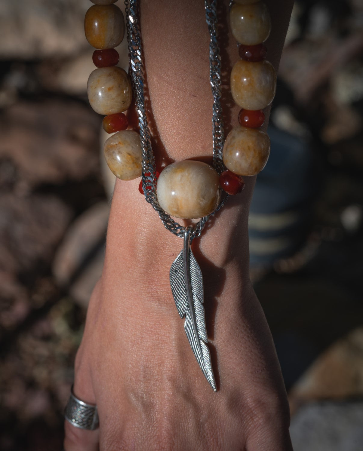 'Life is Sweet' Graduated Honey Jade, Carnelian & Giant Feather Charm Stainless Steel LayerNecklace